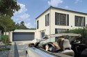 Brama garażowa segmentowa Renomatic/Hormann z napędem Supramatic E i szyną FS10-K - przetłoczenia M Woodgrain. Wymiar 5000x2250m